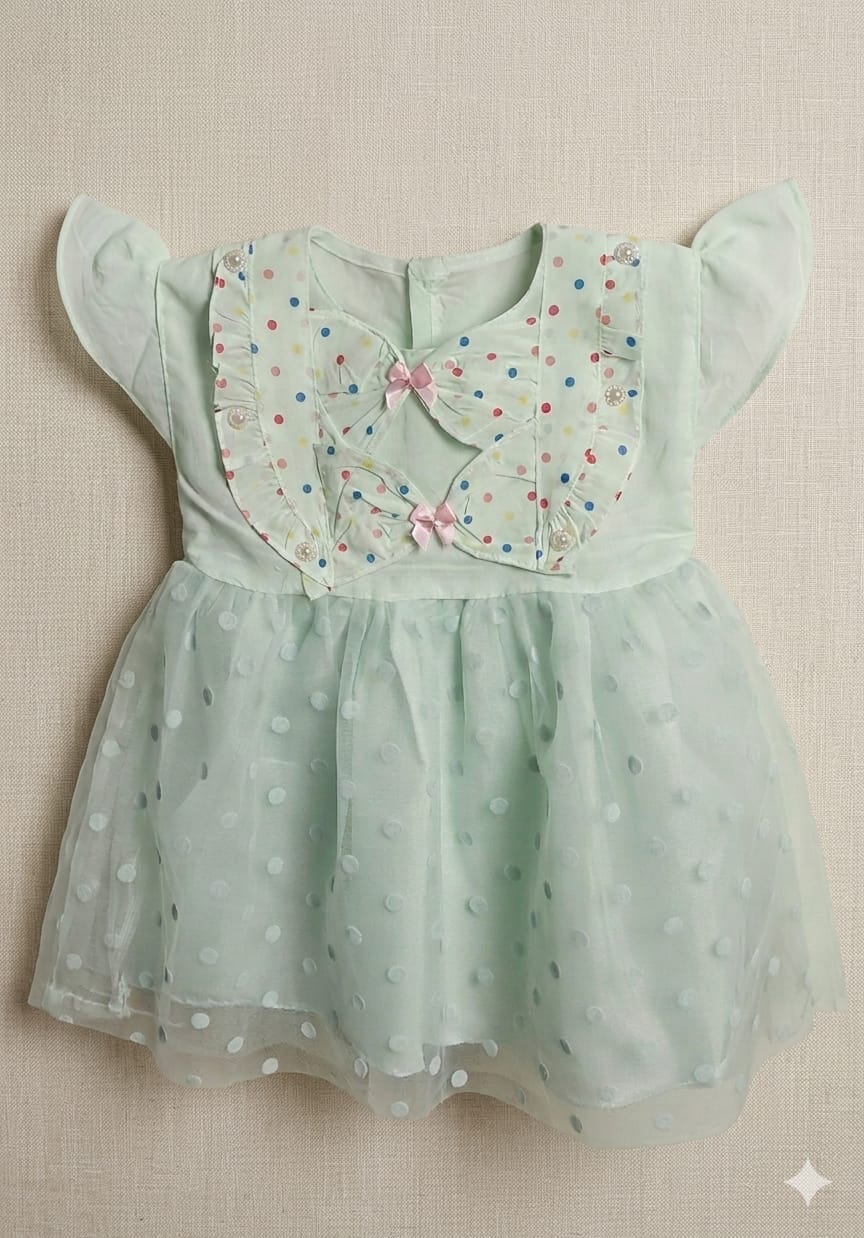 whisperingpoppers summer frocks Mint Green Polka Dot Frock —  Girls age 9 Months to 1.5 Years.flat lay  frock details.multicoloured polka dot desgin on bodice and soft net   doll bottom frock .knee length frock .button on the back side for easy wear