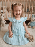 whisperingpoppers summer frocks skyblue hues lawn frock Girl age 9month -1.5 year little girl showing front vew of the frock .perfect smile shows she is comfortable wearing it..lawn fabric perfect for summer season in pakistan.peterpen coller neckline.skyblu base lawn frock with printed white desgin on it .in middle 3 flowers detail give this frock eleganc and beauty.baby pink motive flowers looks beautiful  and enhance the desgin.perfect in hot sumer day long.modest fashion.comfortable breathable  fabric